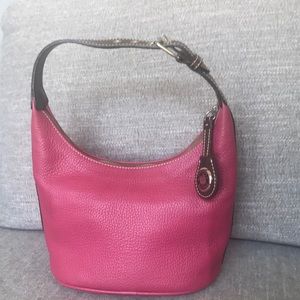 Dooney & Bourke pink/brown leather bucket purse.